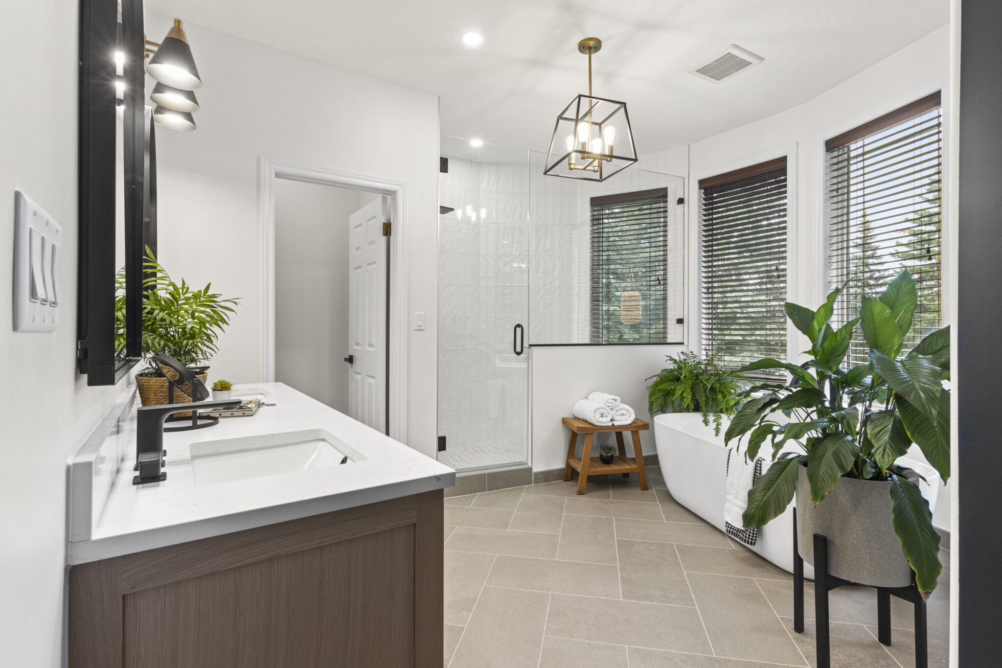 White bathroom with tub and walk-in shower